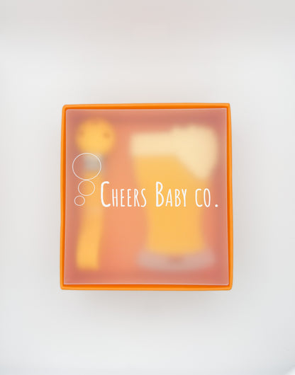 Cheers Baby Co. gift box with soft silicone teether design visible through the packaging on a white background.