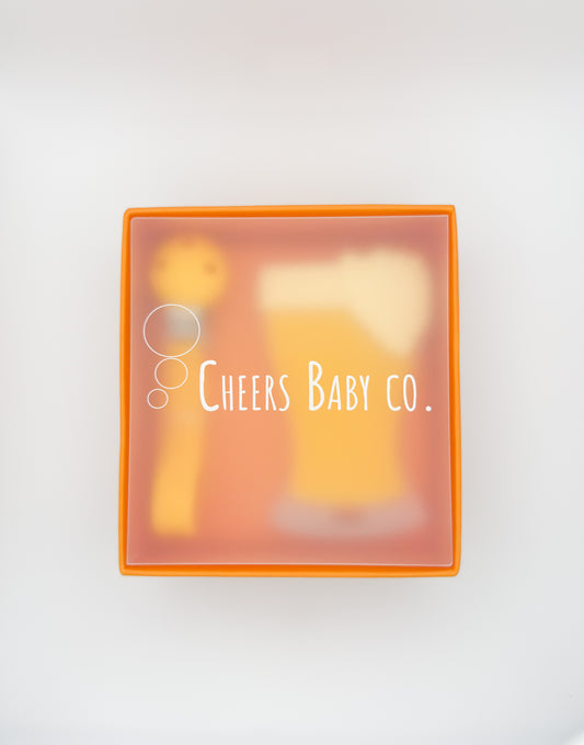 Cheers Baby Co. gift box with soft silicone teether design visible through the packaging on a white background.