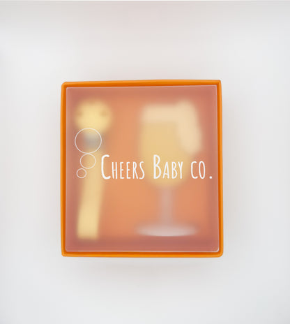 Cheers Baby Co. gift box with soft silicone teether design visible through the packaging on a white background.