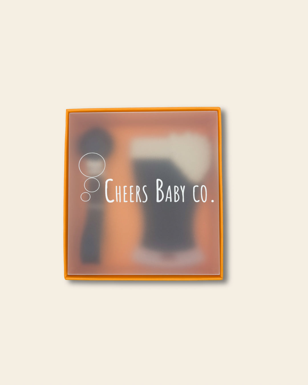 Cheers Baby Co. gift box with soft silicone teether design visible through the packaging on a white background.