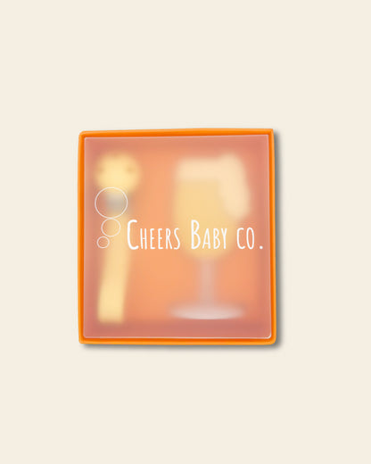 Cheers Baby Co. gift box with soft silicone teether design visible through the packaging on a white background.