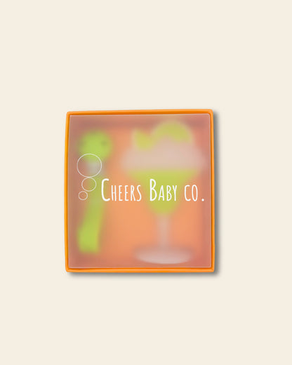 Cheers Baby Co. gift box with soft silicone teether design visible through the packaging on a white background.