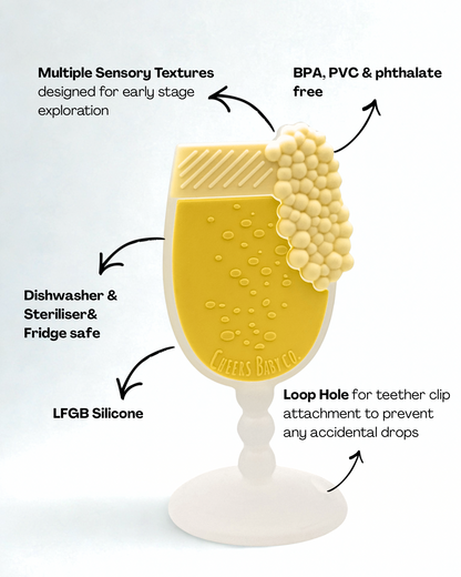 Soft silicone baby teether displayed upright on a white background with textured details