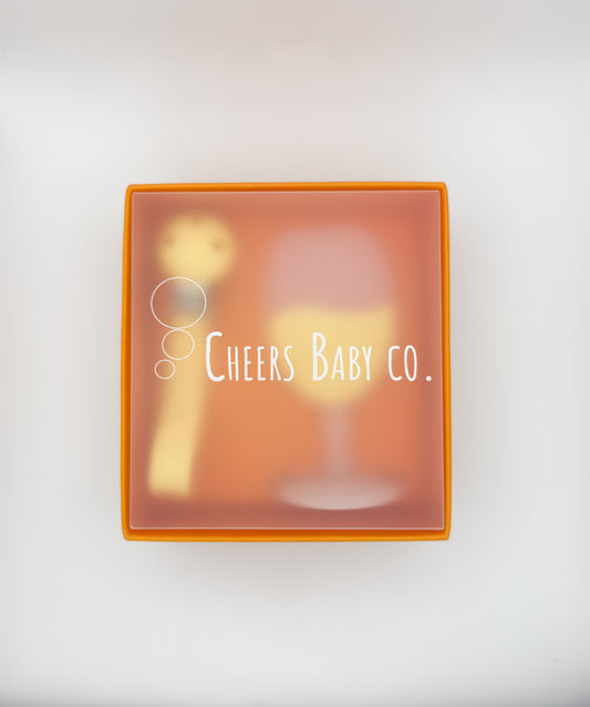 Cheers Baby Co. gift box with soft silicone teether design visible through the packaging on a white background